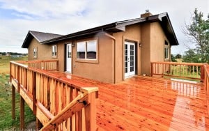 Fire damaged home restoration in Colorado Springs by CMS and FGS - completed exterior with great deck
